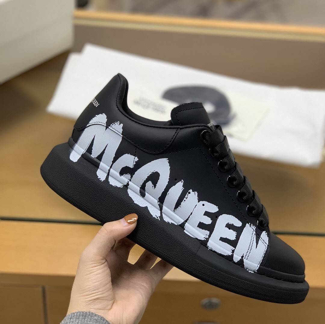 A1exa*der Mcqv*en MQ 3D black letter Sneakers