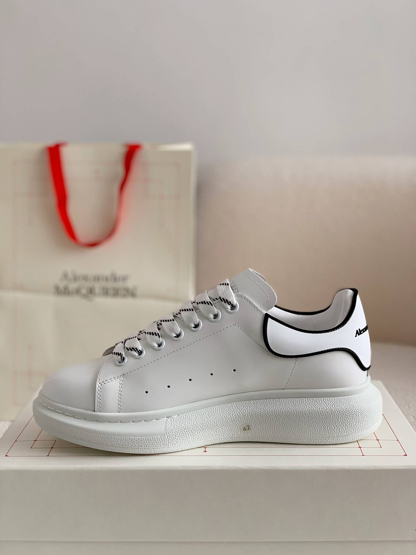 A1exa*der Mcqv*en MQ white film tail Sneakers