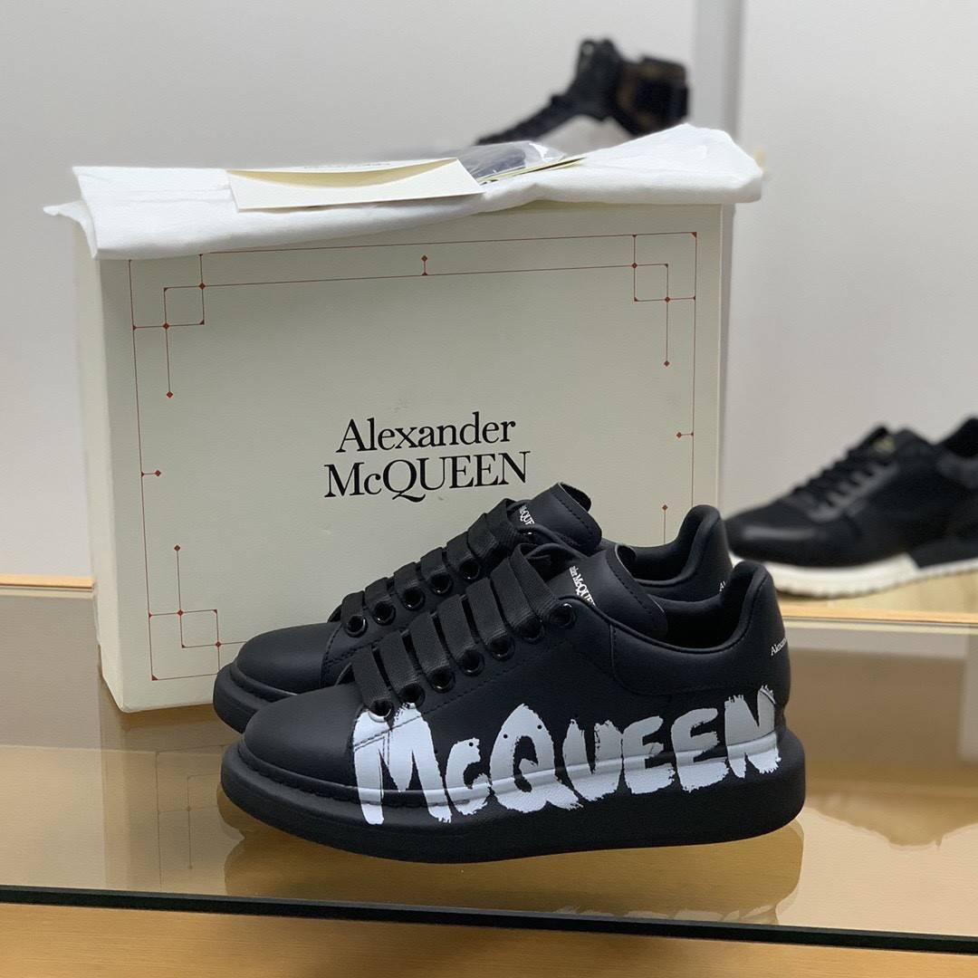 A1exa*der Mcqv*en MQ 3D black letter Sneakers