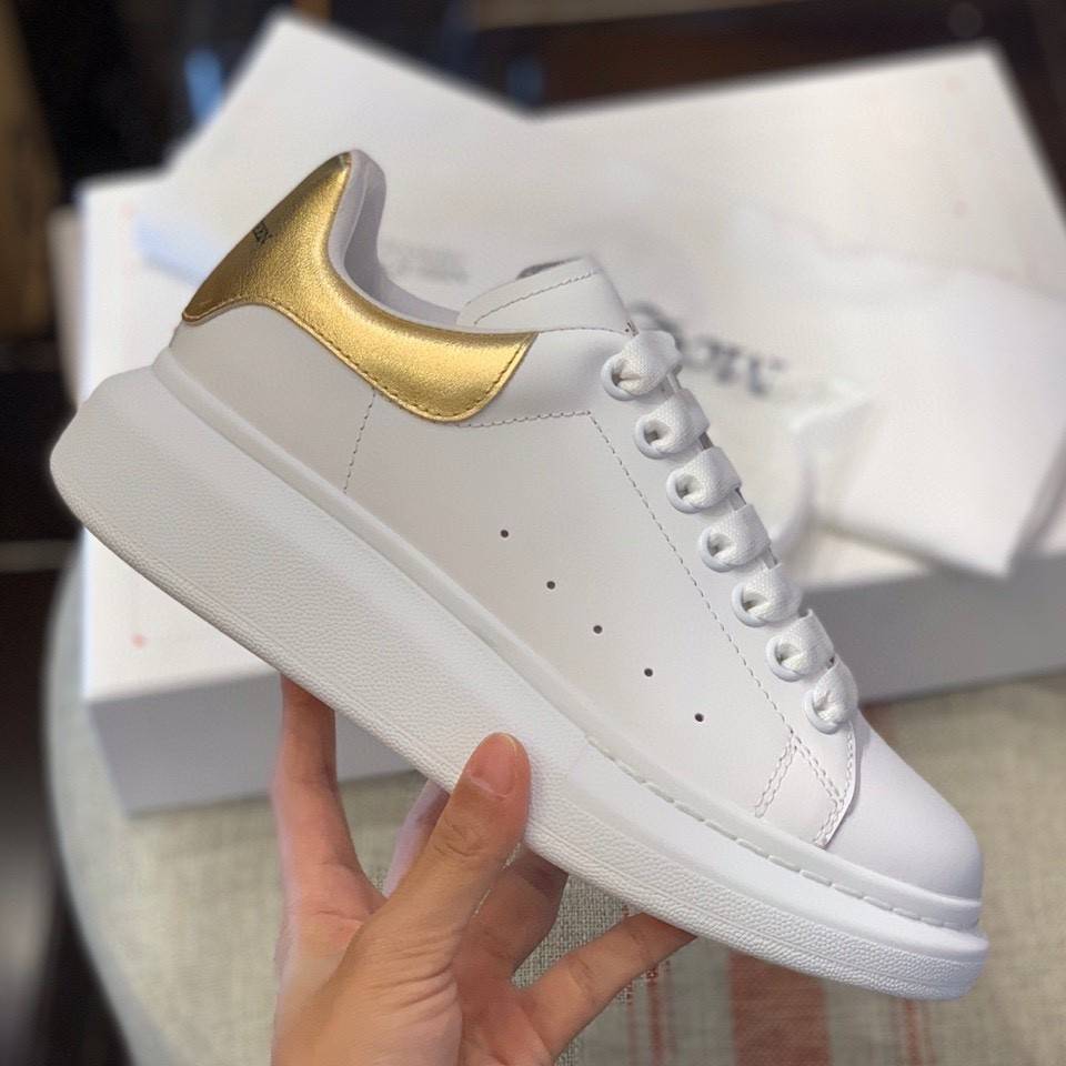 A1exa*der Mcqv*en MQ Gold cowhide tail Sneakers