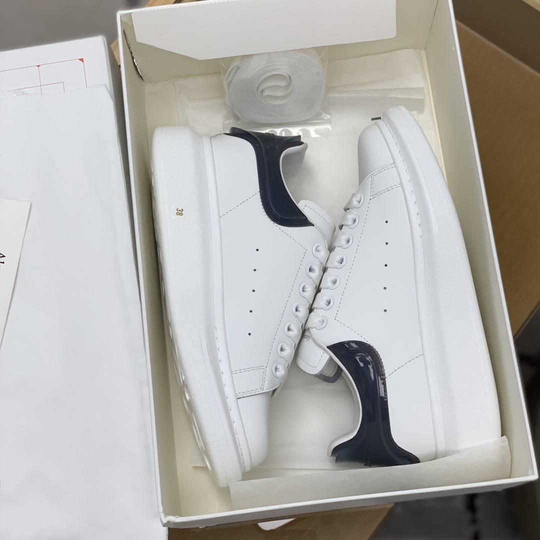 A1exa*der Mcqv*en MQ jelly grey tail Sneakers