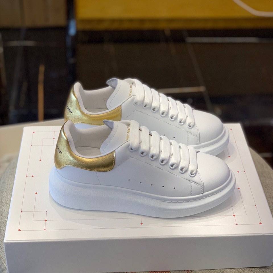 A1exa*der Mcqv*en MQ Gold cowhide tail Sneakers