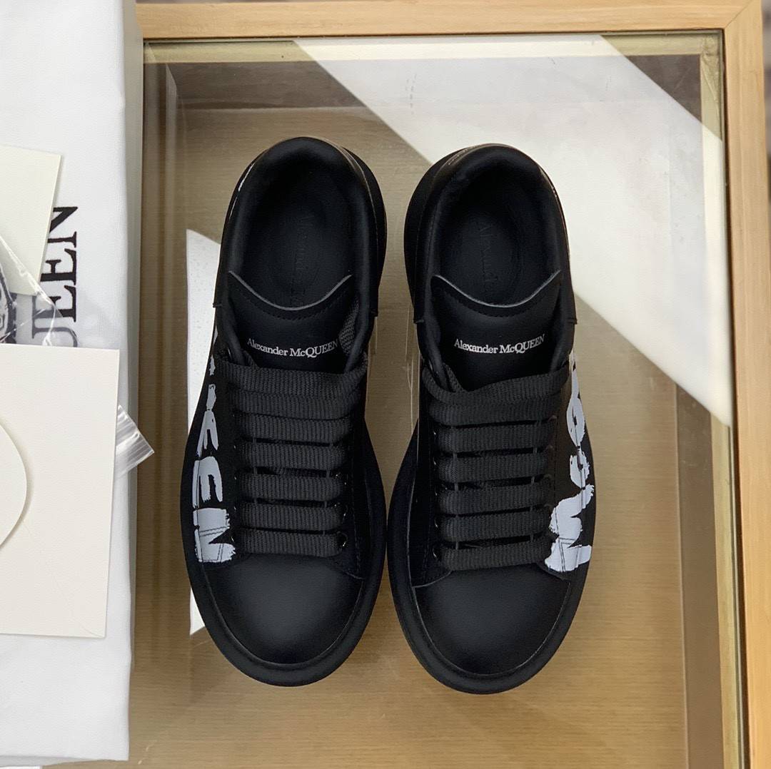 A1exa*der Mcqv*en MQ 3D black letter Sneakers