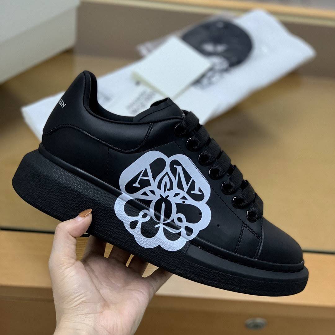 A1exa*der Mcqv*en MQ 3D black bloom Sneakers