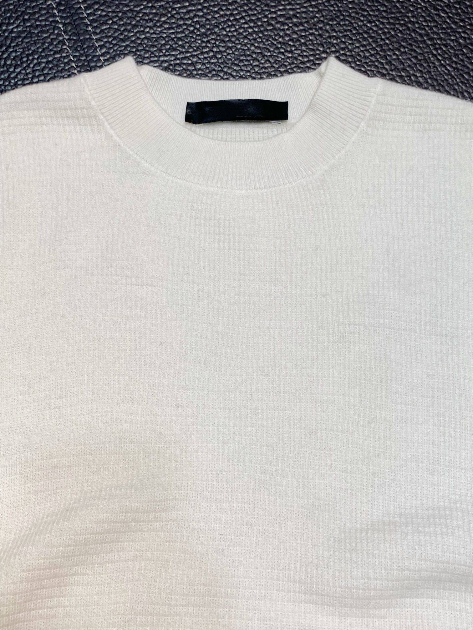 Pra*a Knitted sweaters