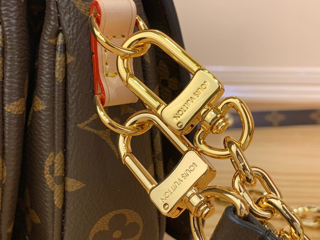 L0vis Vvtt0n Pochette Métis East West Bag