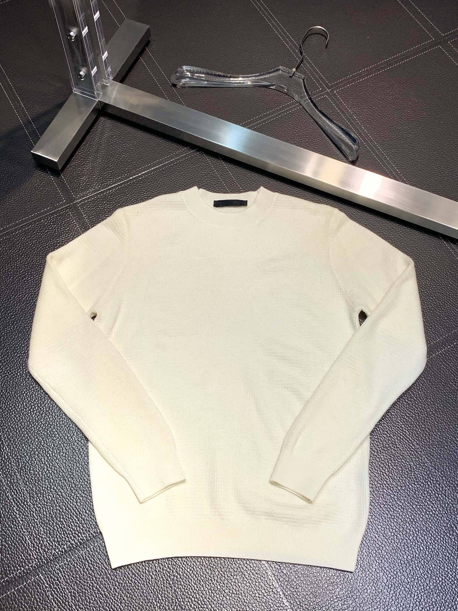 Pra*a Knitted sweaters