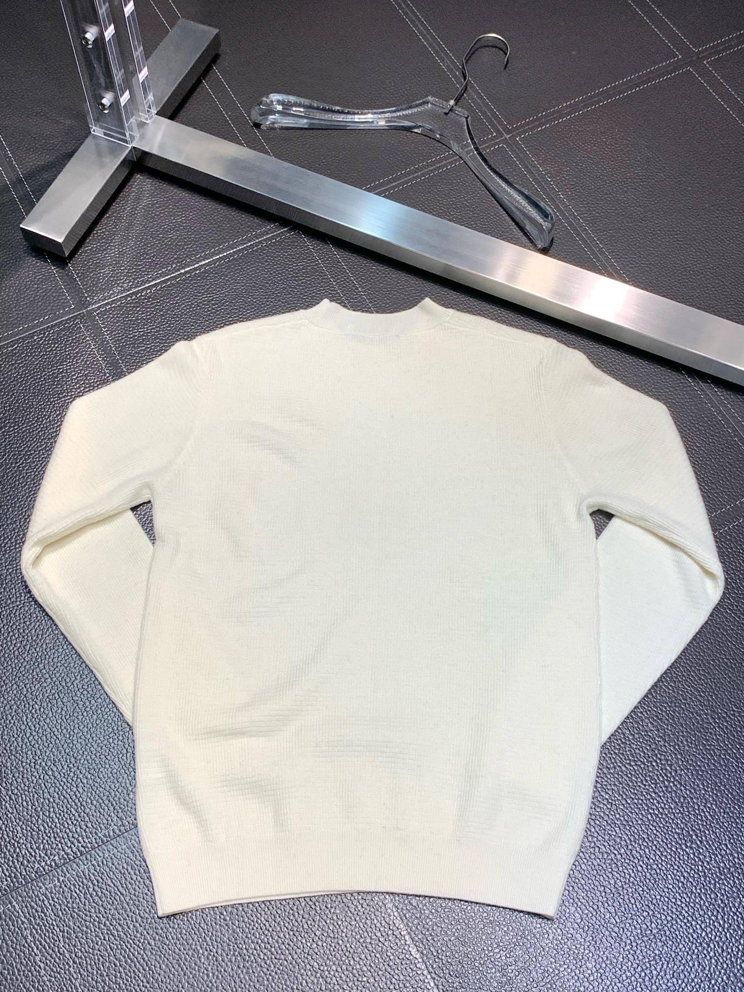 Pra*a Knitted sweaters