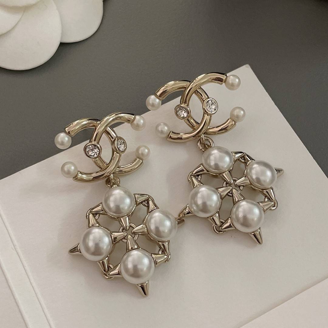 Ch**el rivet earrings