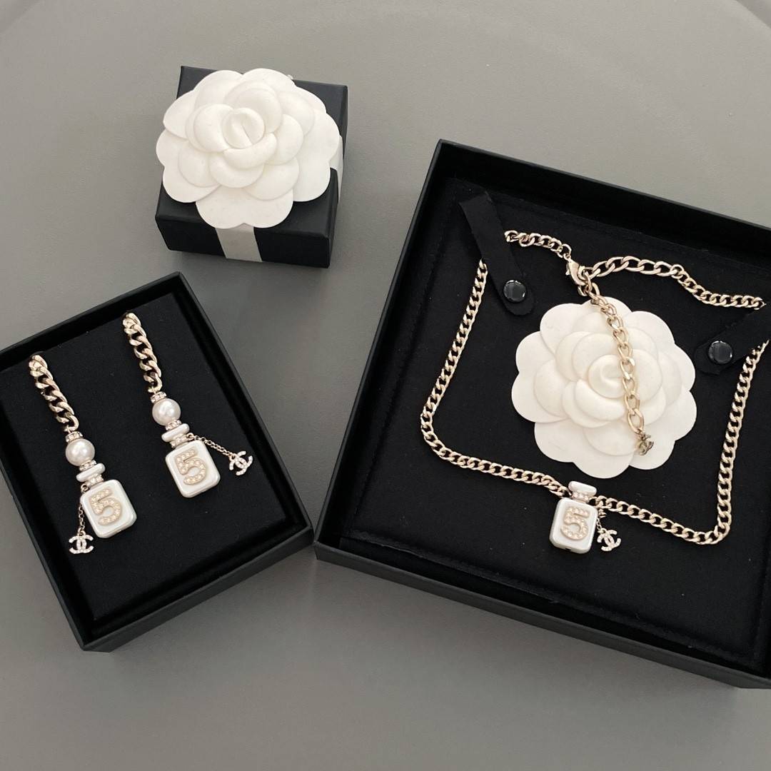 Ch**el Perfume Bottle Stud Earrings